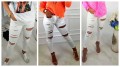 Obłędne spodnie jeans z dziurami Slim Fit białe